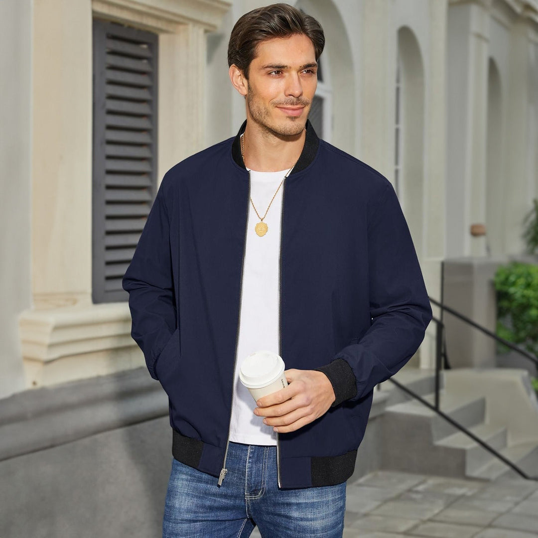 The interior lining of a men's polyester bomber jacket, emphasizing its lightweight construction