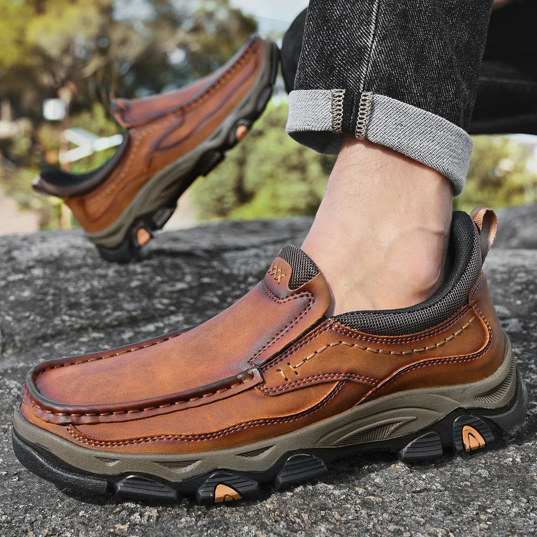 Men's orthopedic slip-on leather walking shoes, paired with casual attire