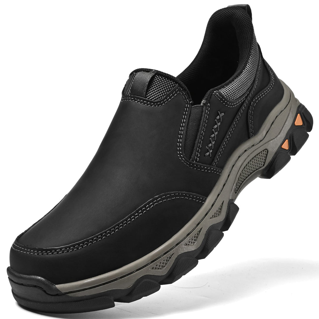 Pair of men's brown leather slip-on walking shoes on a white background