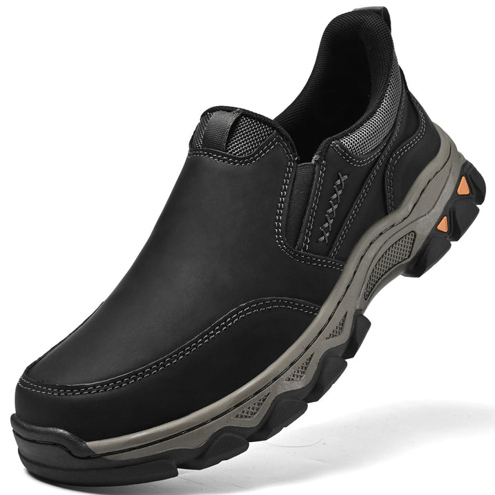 Pair of men's brown leather slip-on walking shoes on a white background