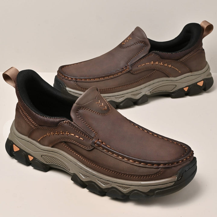 Side view of black men's orthopedic walking shoes, featuring an easy slip-on design