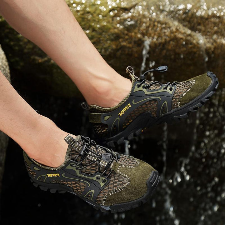 Breathable men's trail shoes with mesh panels, ensuring air circulation for comfortable wear