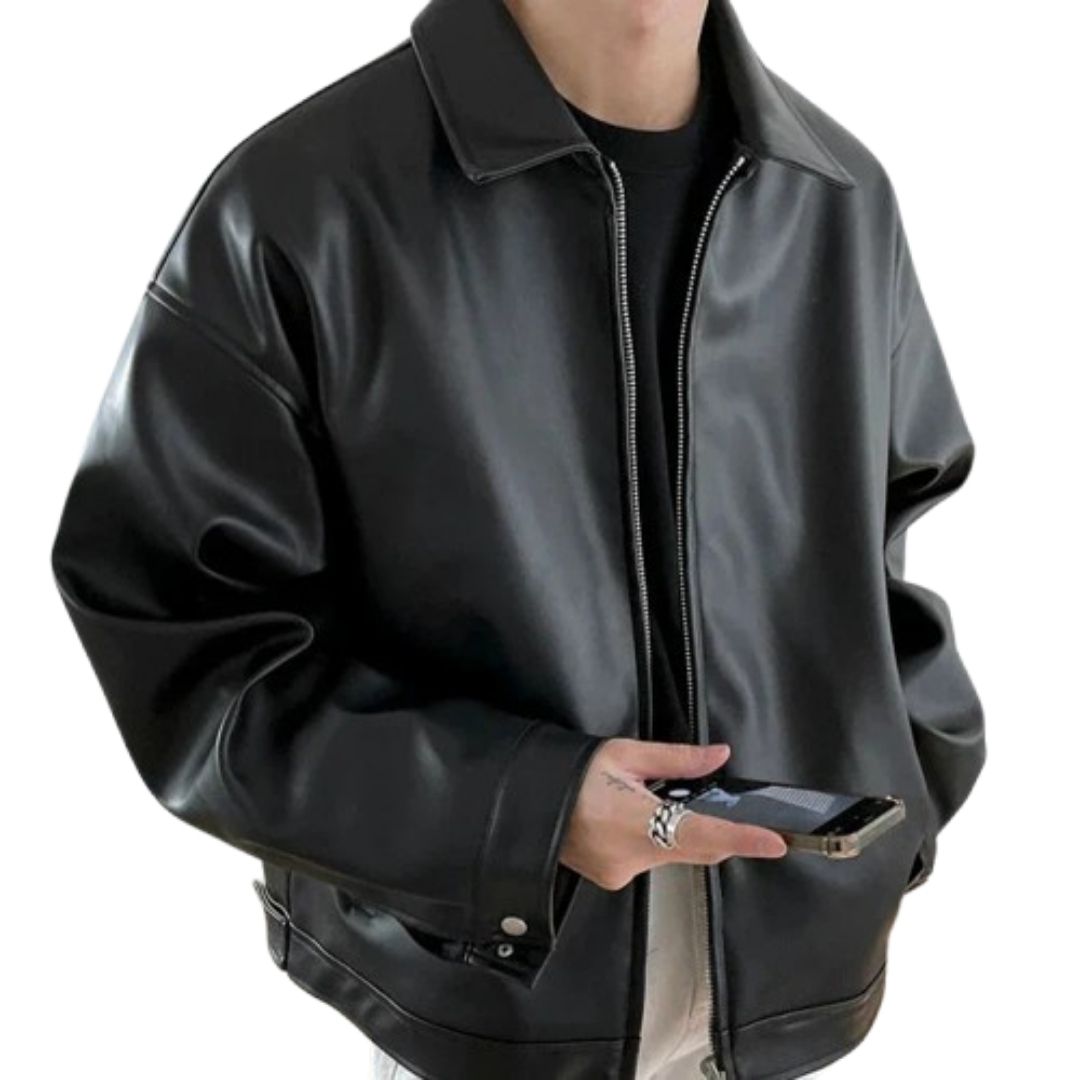 Men's oversized black leather bomber jacket, perfect for streetwear and contemporary fashion.