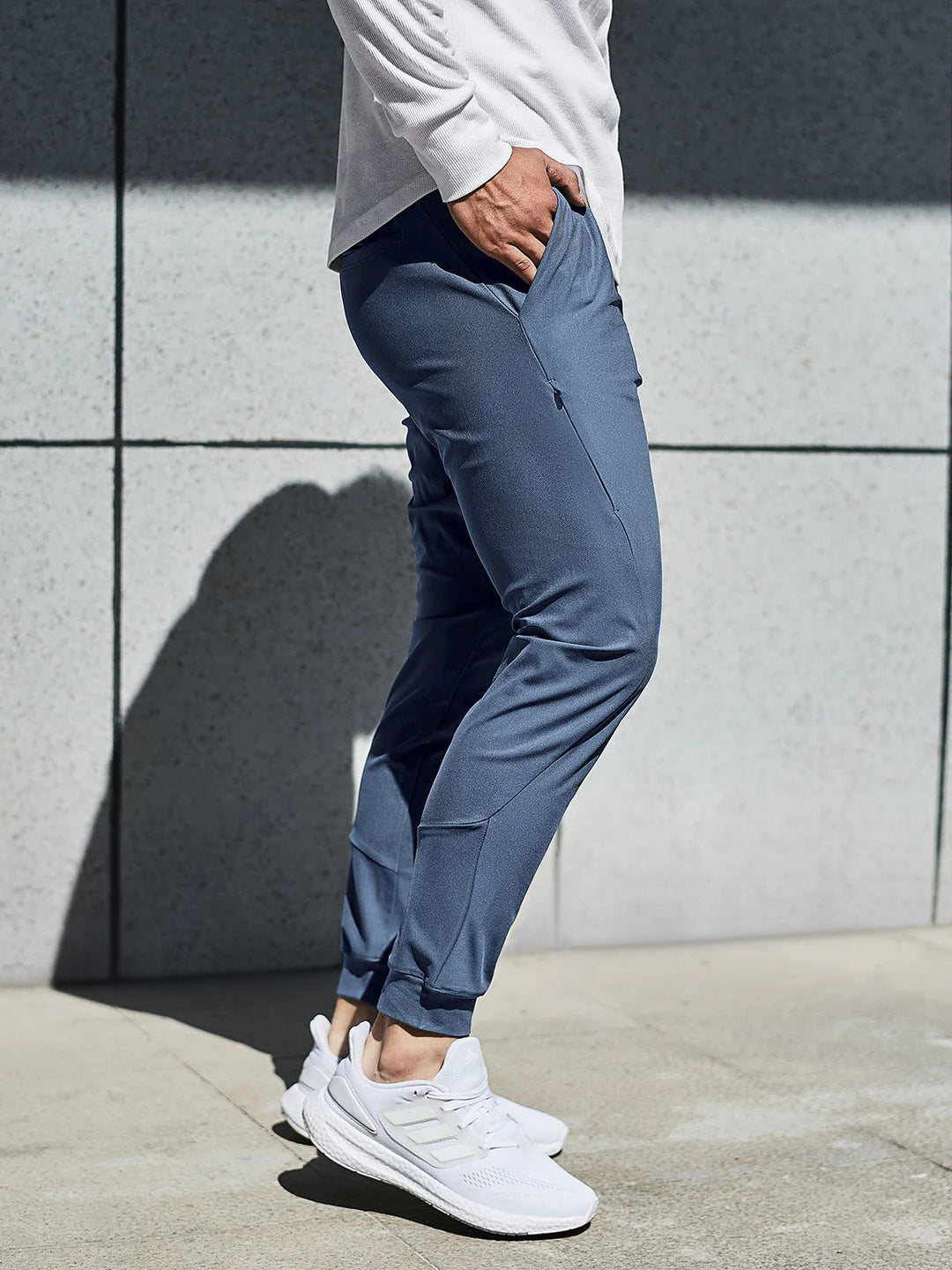 Front view of lightweight men's performance joggers, blue, perfect for daily wear.