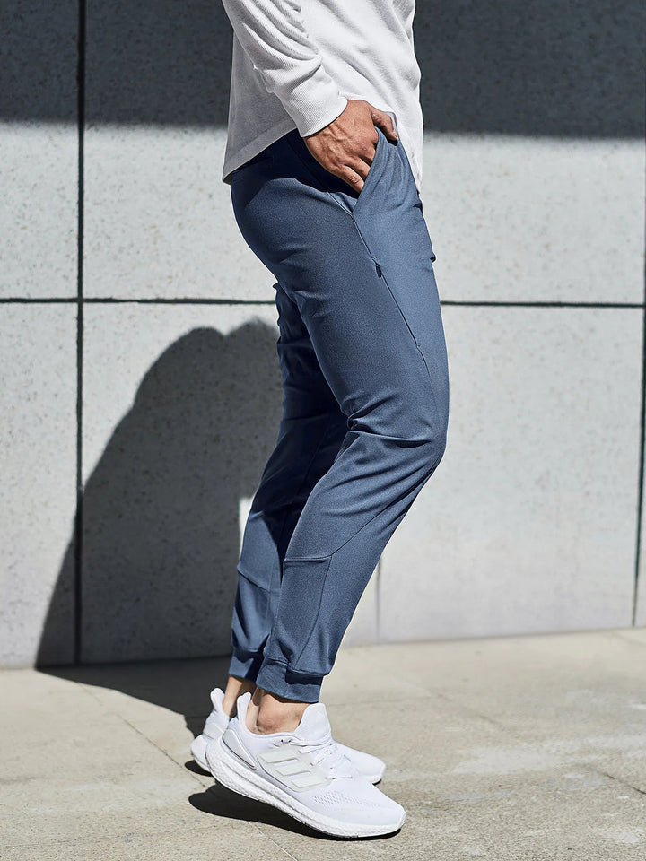 Front view of lightweight men's performance joggers, blue, perfect for daily wear.