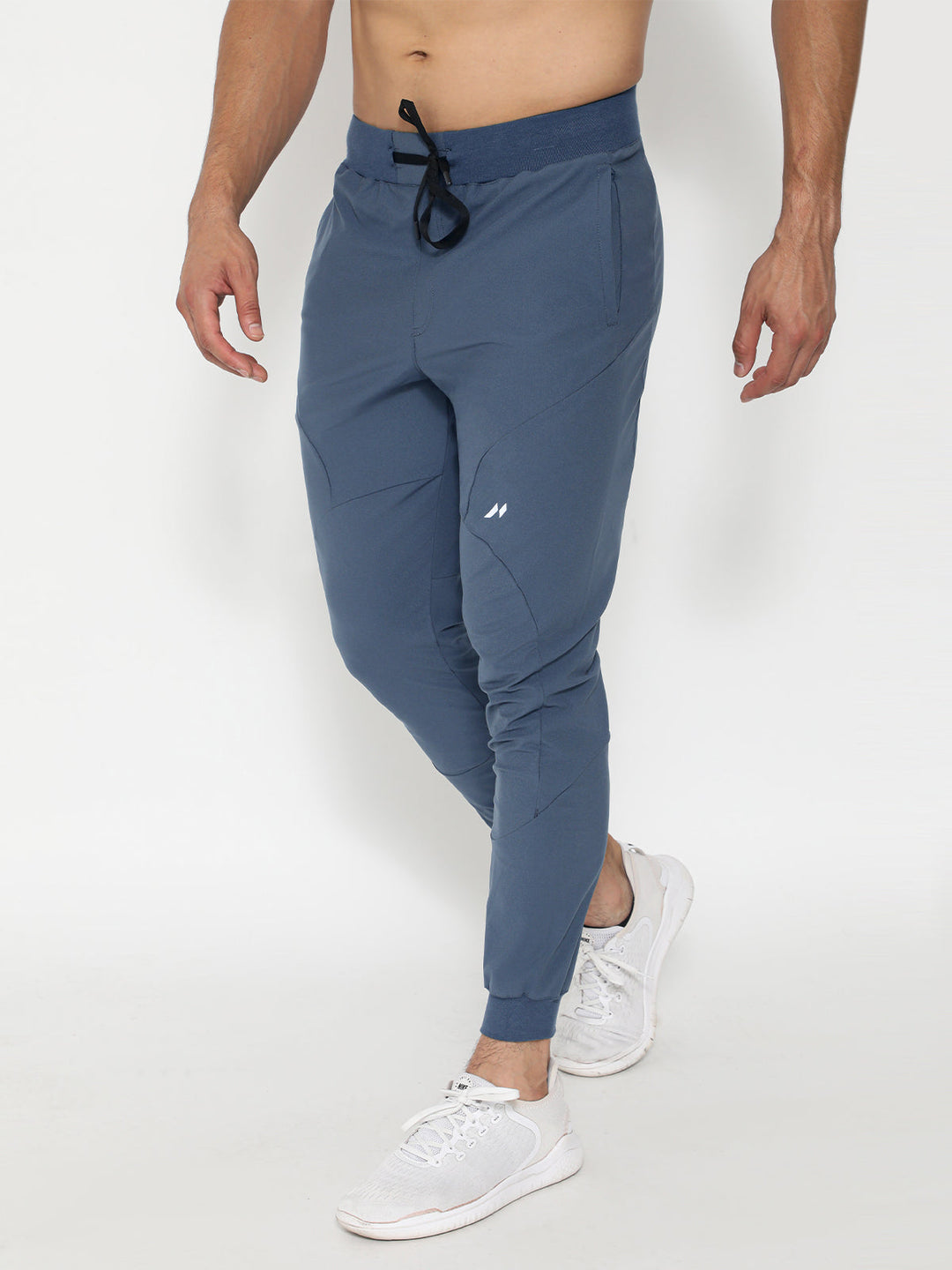 Front view of men's performance joggers, showing tapered fit and functional pockets, ready for action.