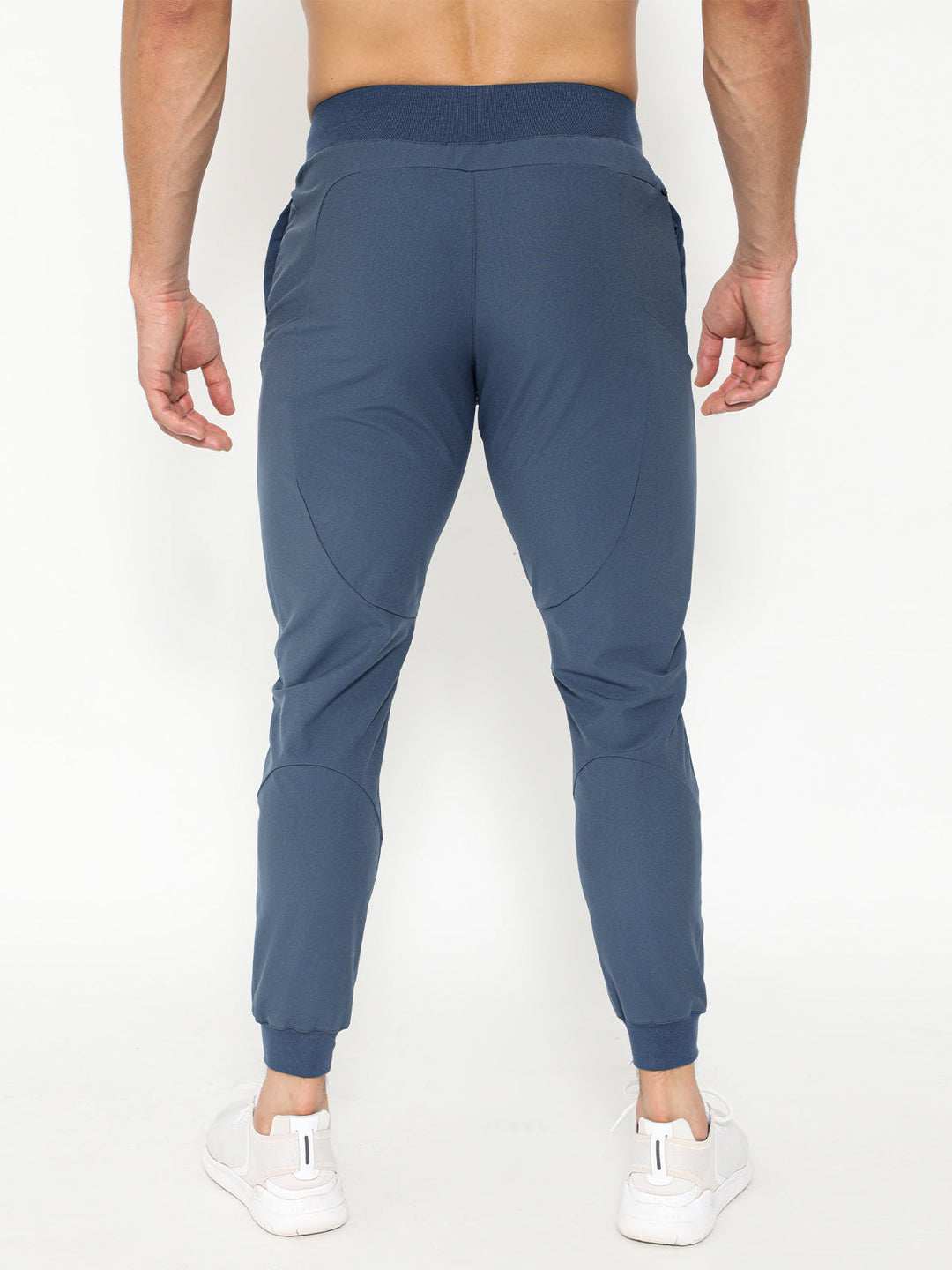 Back view of men's athletic joggers, highlighting comfortable fit and quality stitching, perfect for running.