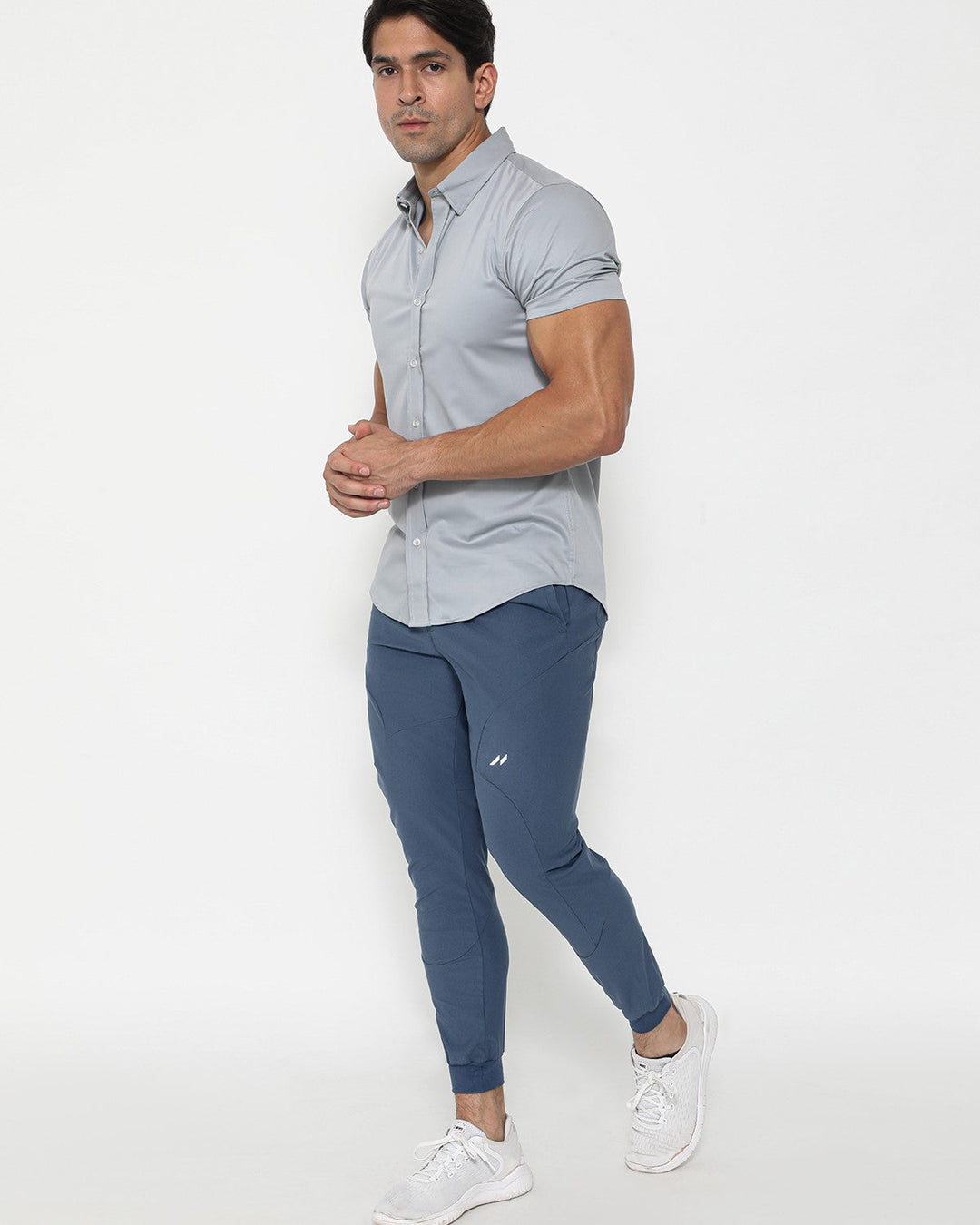 Men's performance joggers in a sporty setting, demonstrating their flexibility and freedom of movement.