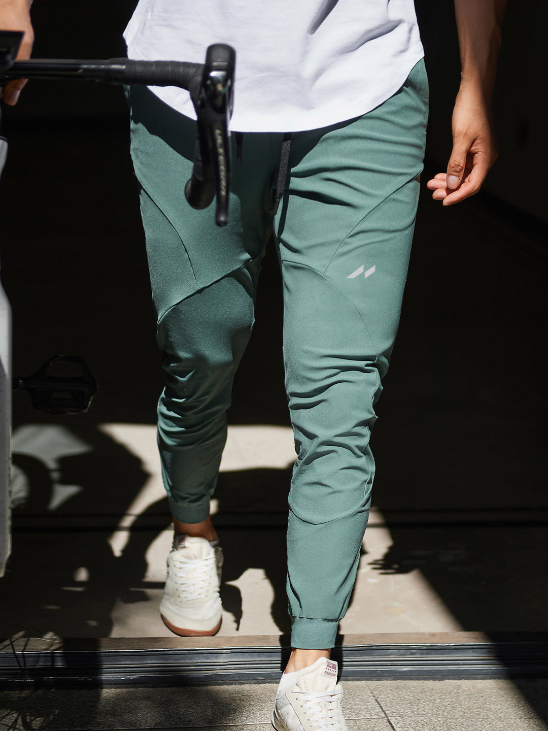 Folded men's performance joggers, showcasing fabric quality, quick-dry and stretch for active lifestyles.