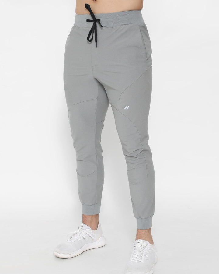 Tapered fit men's performance joggers in black, great for jogging, gym, or everyday casual wear.