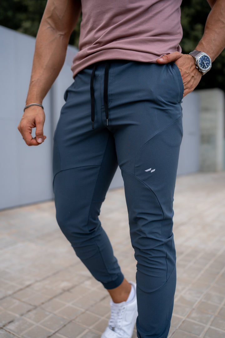 Men's active leisure joggers, athletic pants with pockets, comfortable stretch material for daily use.