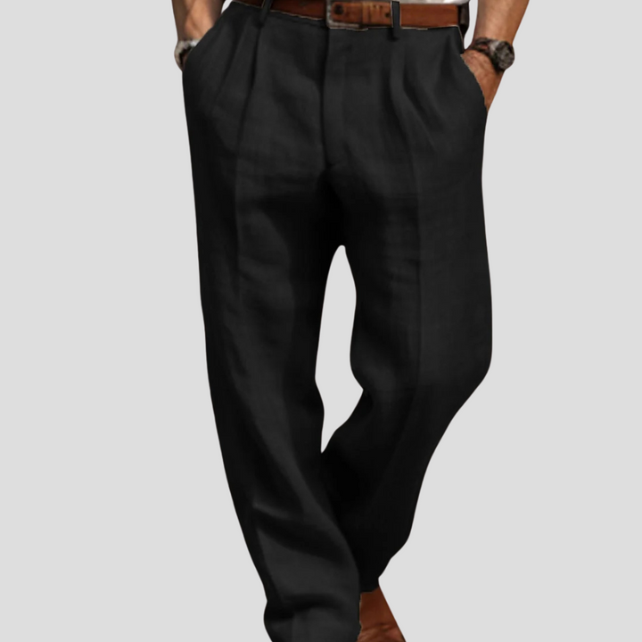 Classic men's fashion: pleated linen trousers in a versatile neutral shade, perfect for casual or smart-casual wear.