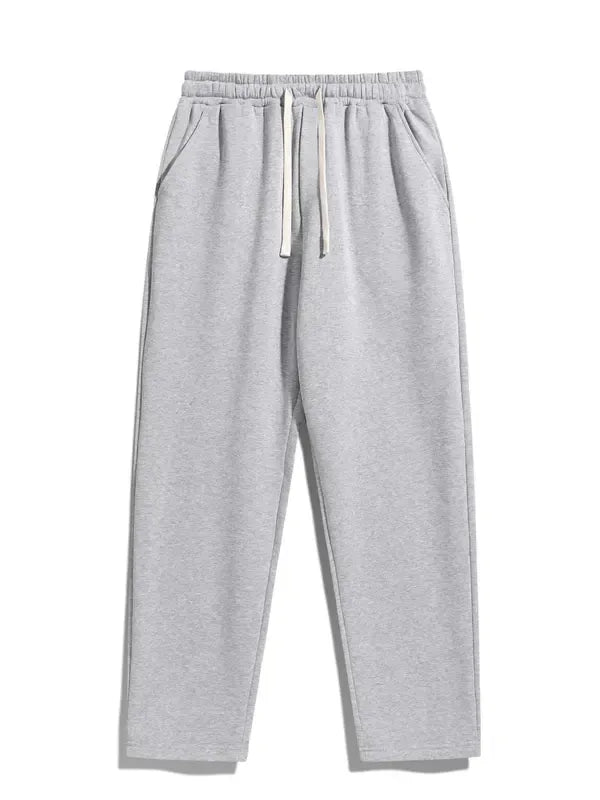 Men's premium cotton blend fleece sweatpants in a minimalist style, perfect for lounging or casual wear.