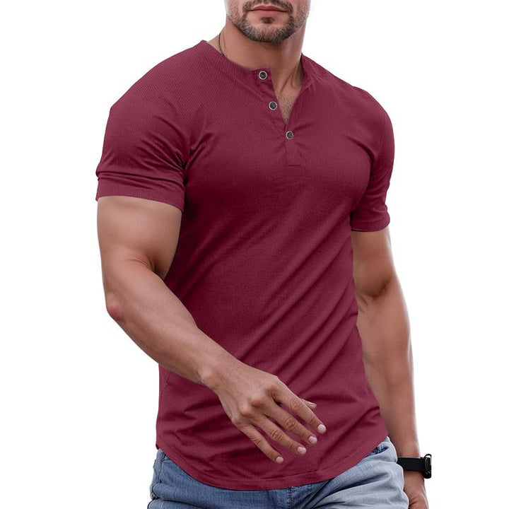 Stacked men's premium cotton Henley tees in various colors, emphasizing selection and quality.
