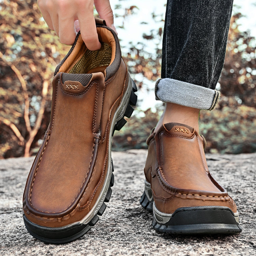 Men's practical slip-on shoes, grey leather, comfortable design for walking, orthopedic features highlighted