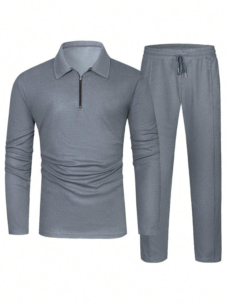 Full view of a men's lounge set, featuring a textured two-piece outfit with zip-neck and drawstring pants.