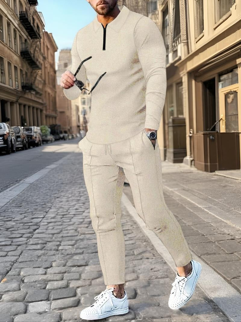 Detail of the drawstring pants from a men's textured knit lounge set, emphasizing the comfortable fit.