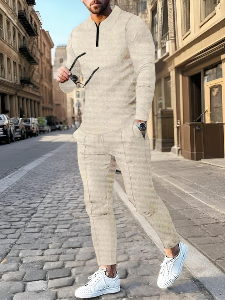 Detail of the drawstring pants from a men's textured knit lounge set, emphasizing the comfortable fit.