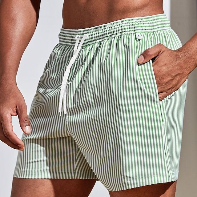 Comfortable men's quick-dry striped shorts, versatile beachwear for all your summer and vacation activities.