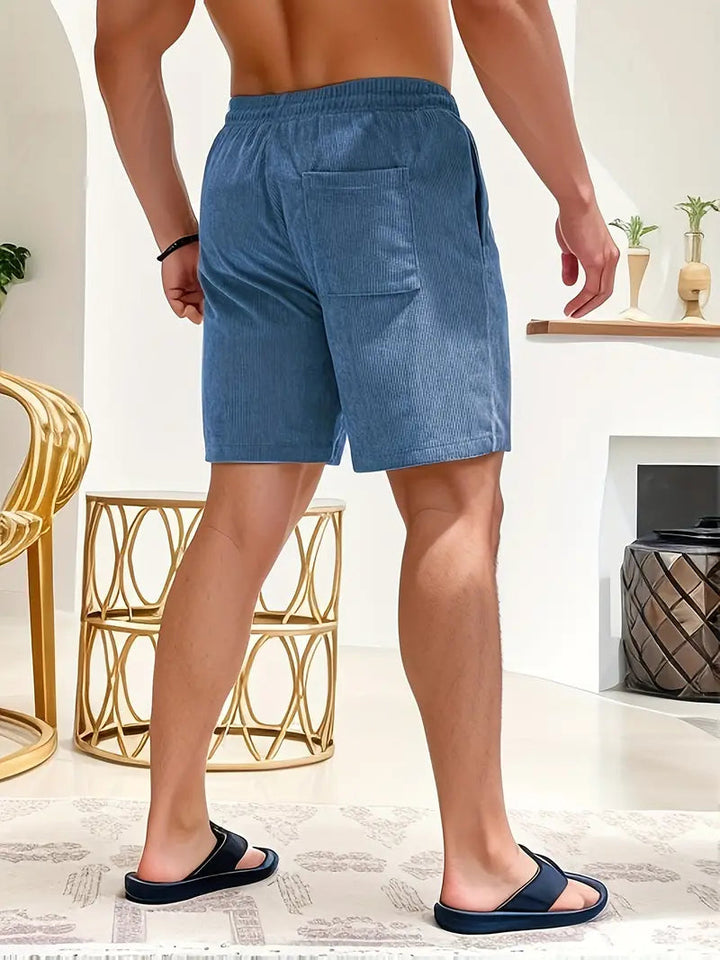 Men's quick-dry drawstring board shorts, ideal for surfers & beach enthusiasts.