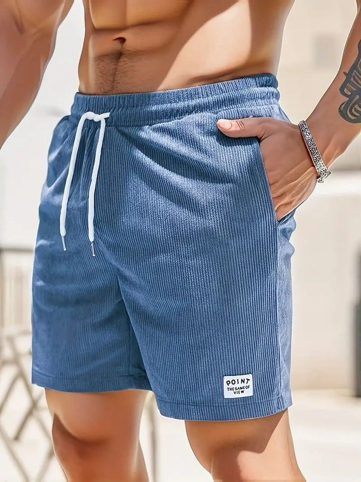 Stylish men's swimwear with elastic waist, ideal for beach, pool, and casual summer fashion.