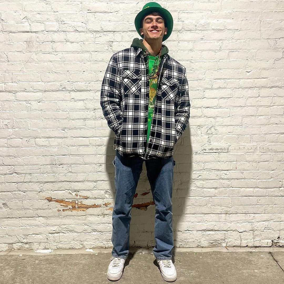 Men's quilted flannel jacket hanging on a wooden hanger, emphasizing its quality and design