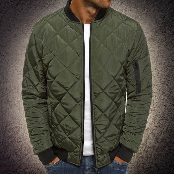 Fashionable men's quilted bomber jacket in a neutral color, a versatile addition to any wardrobe