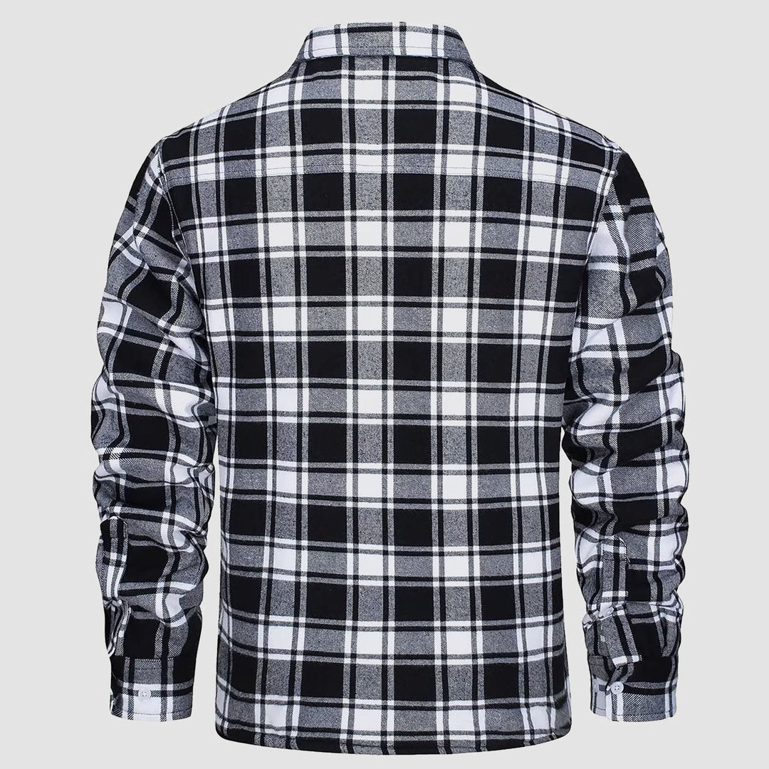 Hanging display of a men's button-down fleece lined flannel jacket, showcasing its quality and design
