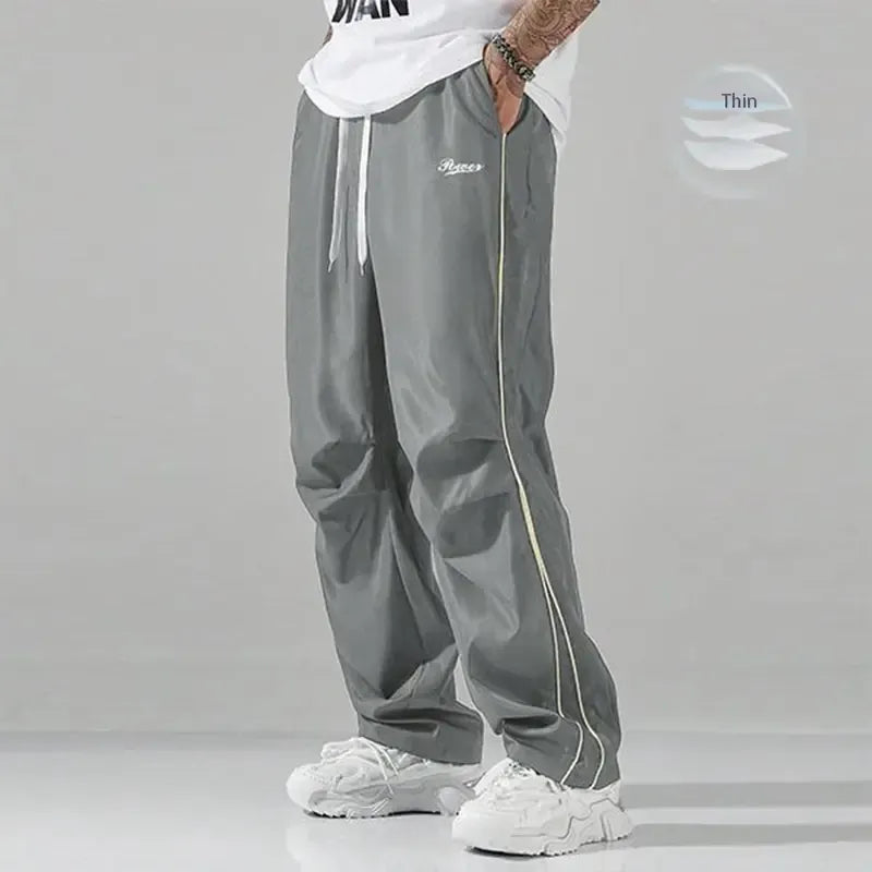 Straight leg men's joggers in a relaxed fit, ideal for sportswear and everyday casual fashion.