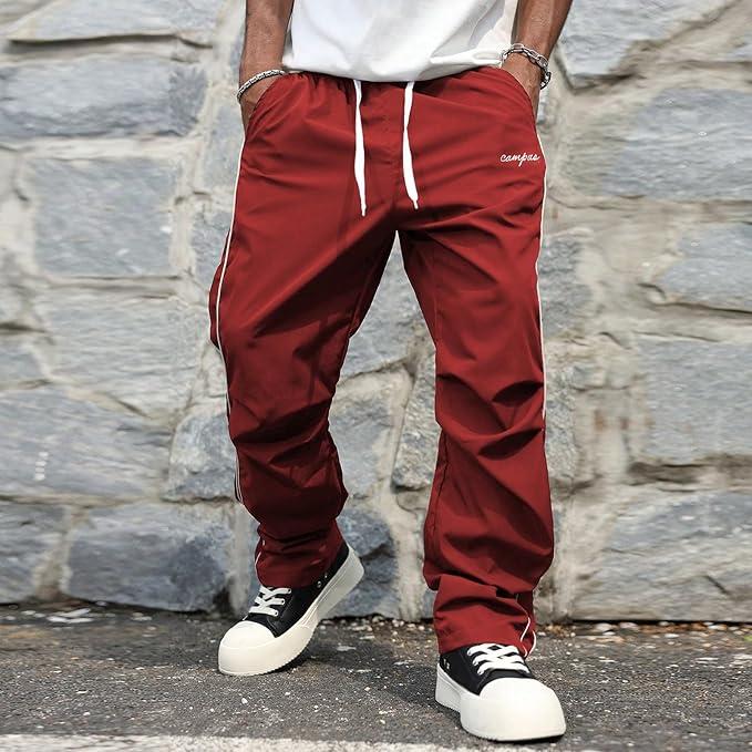 Stylish relaxed fit men's track pants, combining comfort and sportswear aesthetics for modern casual wear.