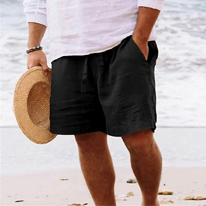 Summer men's relaxed fit shorts, chino fabric, with practical drawstring and utility pockets.