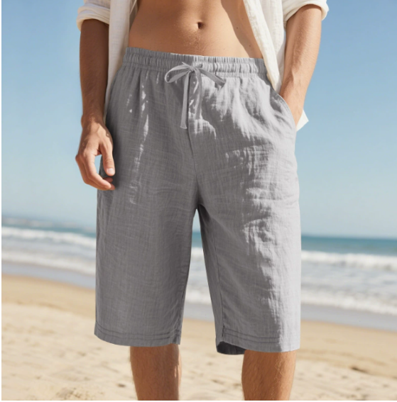 Knee-length men's chino shorts with a flexible drawstring and relaxed fit, perfect for casual warm-weather style.