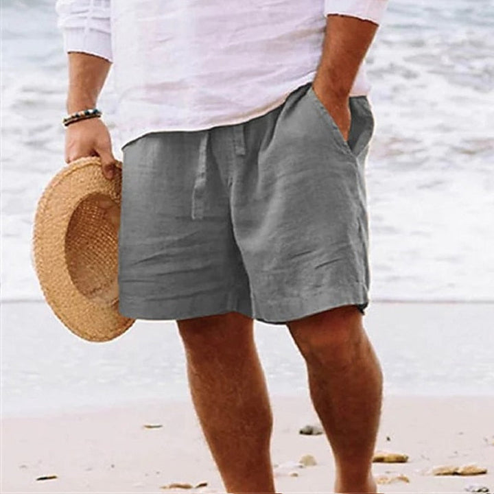 Relaxed fit men's casual shorts, chino material, drawstring waist for ultimate summer comfort.