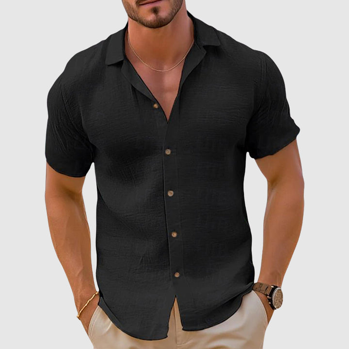 Effortless men's linen button-down shirt. Relaxed fit, long-sleeve, perfect for casual summer & everyday wear.