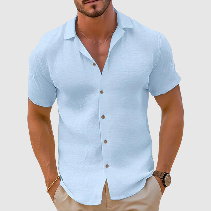 Comfortable men's long-sleeve linen shirt. Relaxed fit button-down, ideal for casual summer style & beach wear.