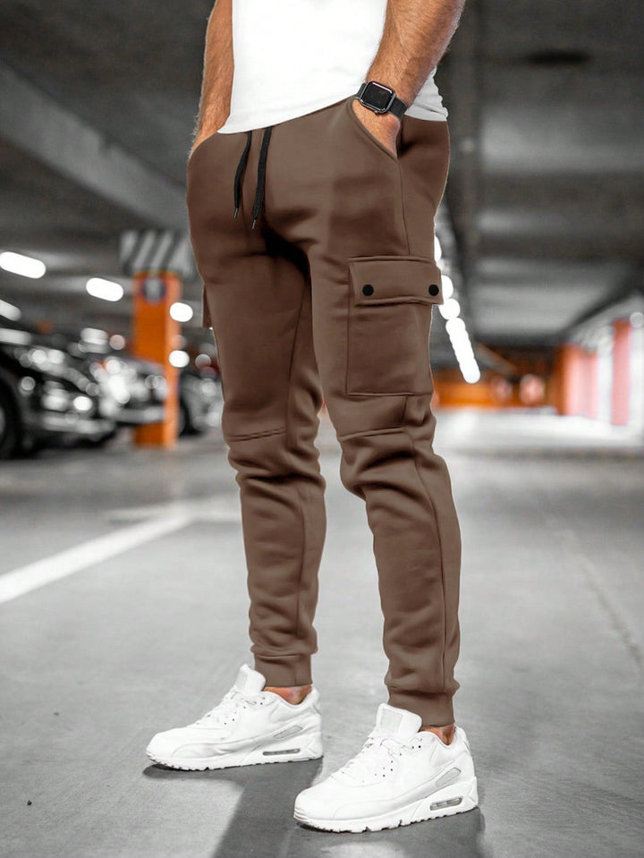 Men's casual slim-fit joggers, featuring an adjustable waist & tapered leg for perfect fit.