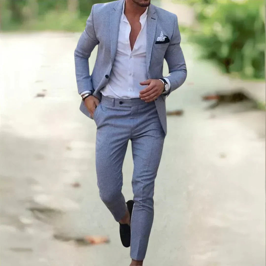 Versatile men's slim fit two-piece suit, embodying modern fashion for formal wear, business, or special occasions.
