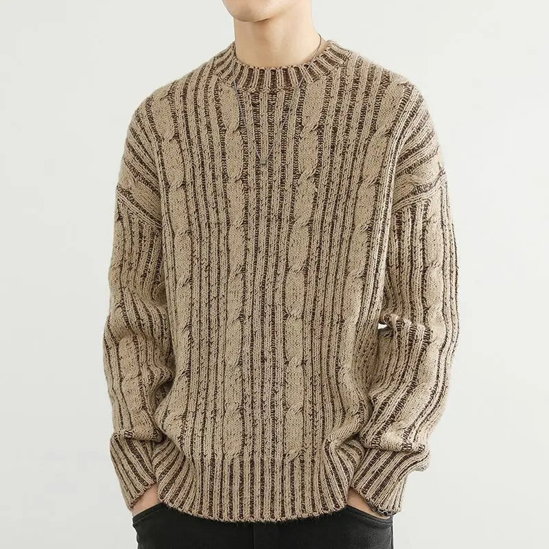 Fashionable men's long sleeve cable knit crewneck sweater with classic striped pattern.