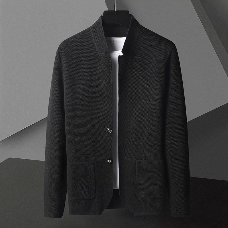 Stylish man wearing a gray structured knit casual jacket, front view, versatile outerwear