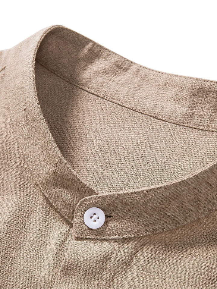 Men's casual two-piece outfit: band collar shirt & trousers. Ideal for relaxed everyday wear or summer events.