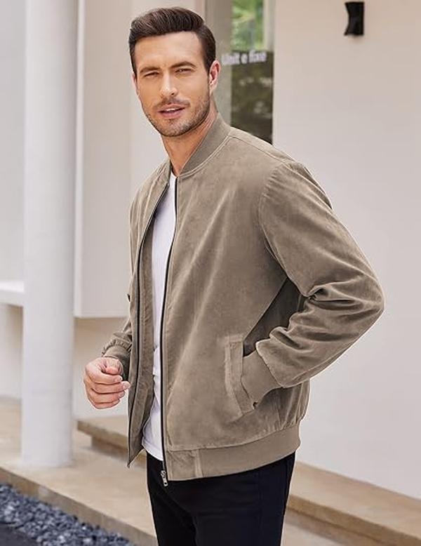 Model wearing a men's stylish suede-look bomber jacket, showcasing its modern fit.