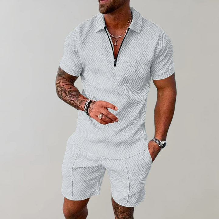 Breathable men's summer two-piece shorts set, relaxed fit short sleeve top, comfortable casual wear.