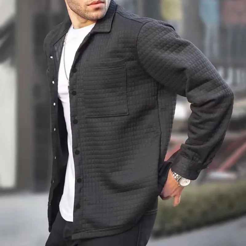 Men's textured button-down jacket, dark fabric, casual outerwear, smart casual apparel.