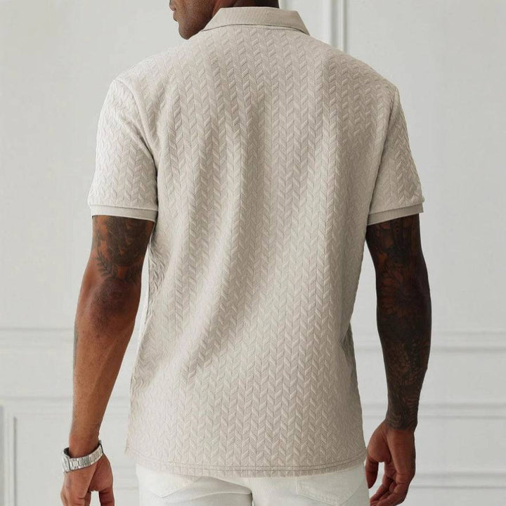 Versatile men's short sleeve polo shirt with textured fabric. Breathable & smart casual for warm weather.