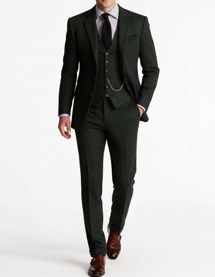 Gentlemen's tweed three-piece suit in a neutral tone, ideal for spring business attire and formal events.