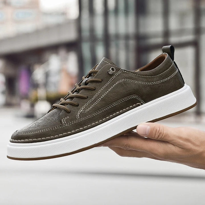 Classic black men's leather sneakers, urban style casual footwear for everyday wear