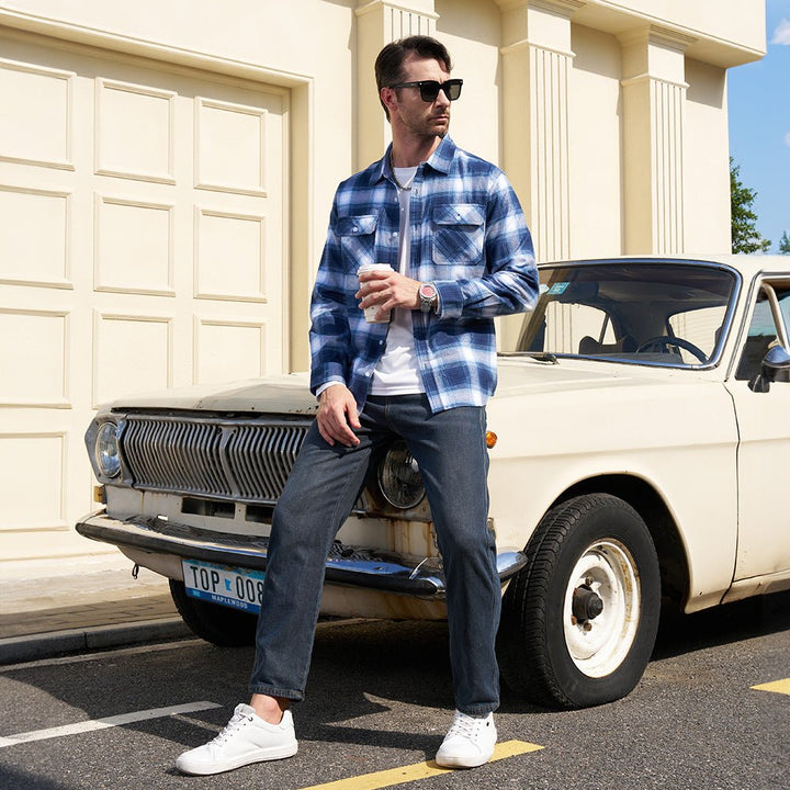 Pair of Men's Verona Plaid Flannel Shirts, one red, one blue, both long sleeve and relaxed fit.