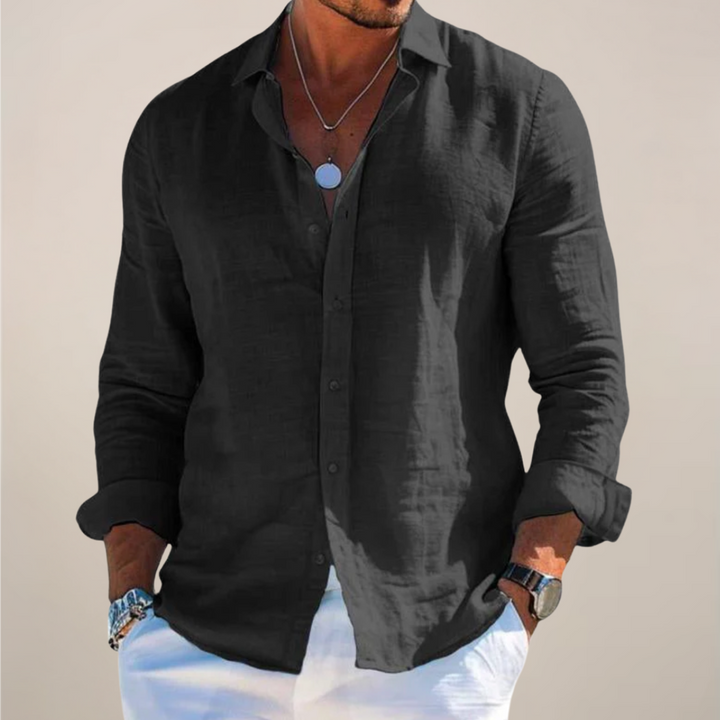Solid color men's collared button-up shirt with long sleeves, a comfortable and versatile everyday menswear staple.
