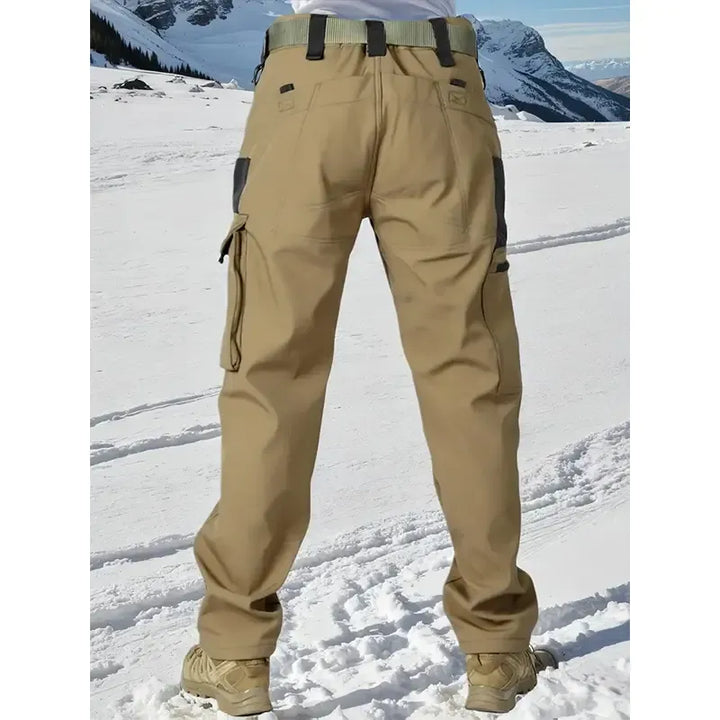 Folded men's warm track pants, made of durable fabric with a cozy fleece interior, front view.