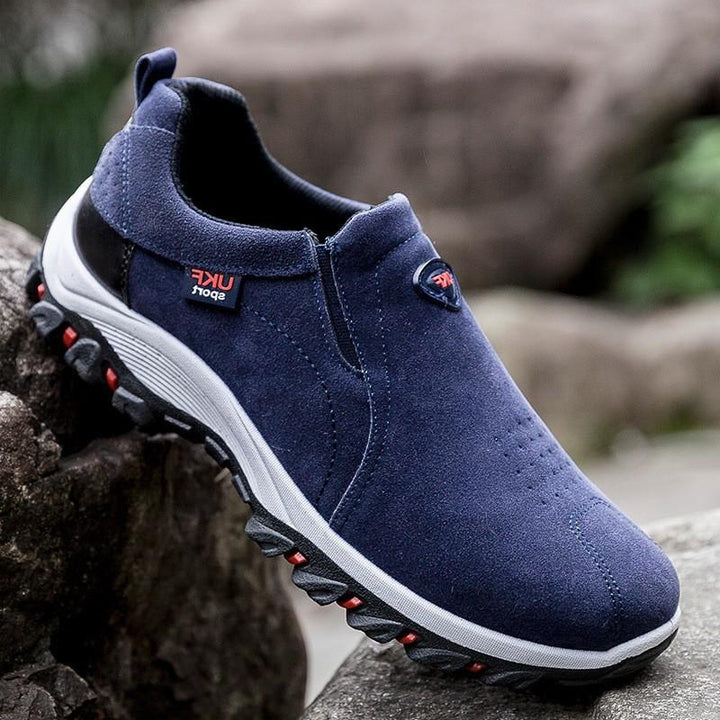 Textured sole of men's waterproof hiking slip-on sneaker for superior traction
